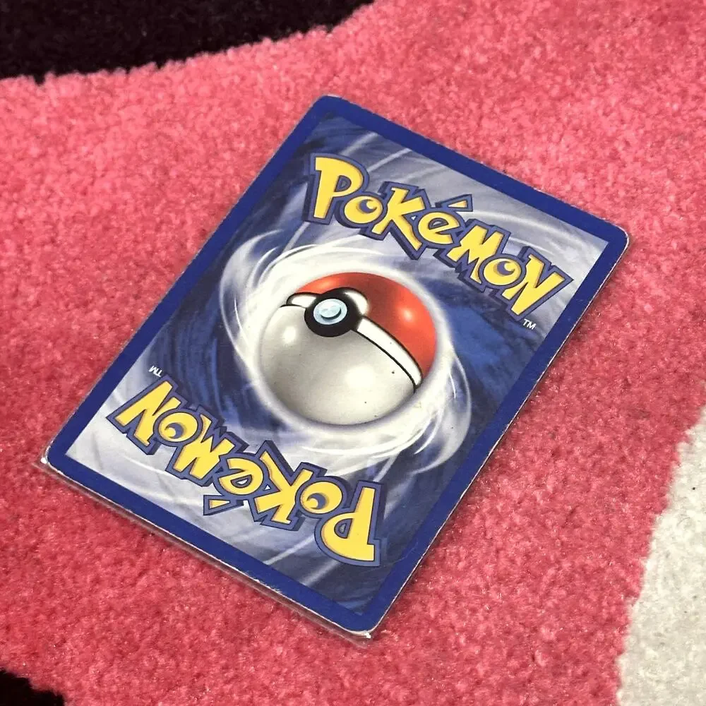 Sneasel #25 – Pokémon Neo Genesis – As Pictured